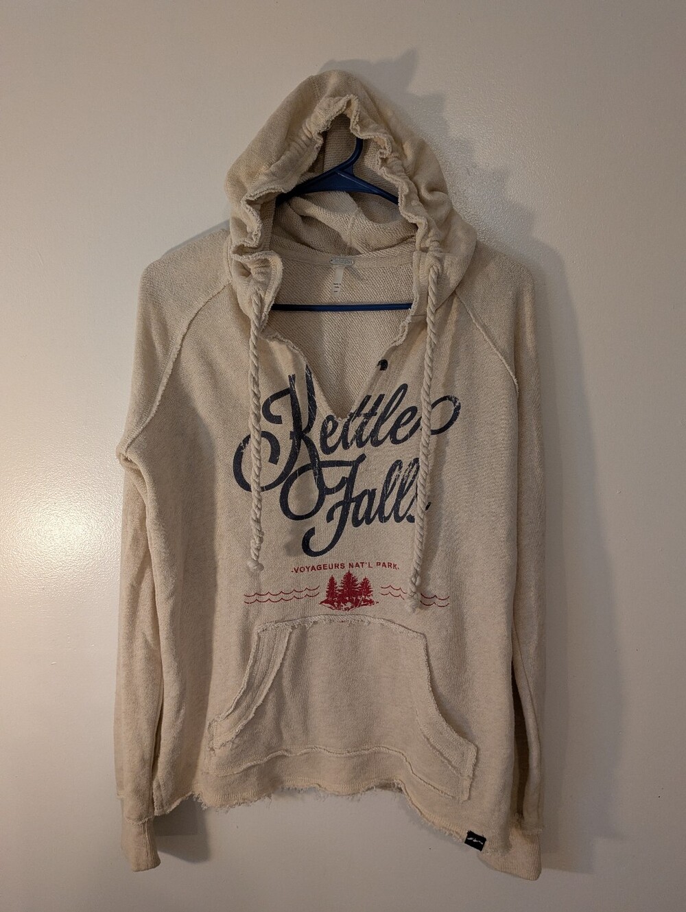 Kettle Falls Distressed Cream Hoodie with Script Graphic
